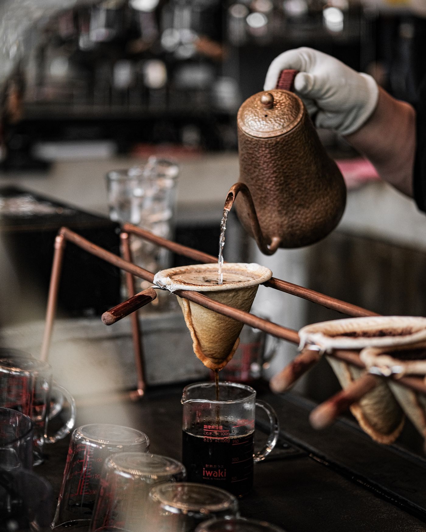 A pour-over being brewed by hand
